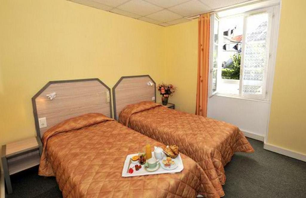 Le Compostelle Hotell Vézelay Rom bilde