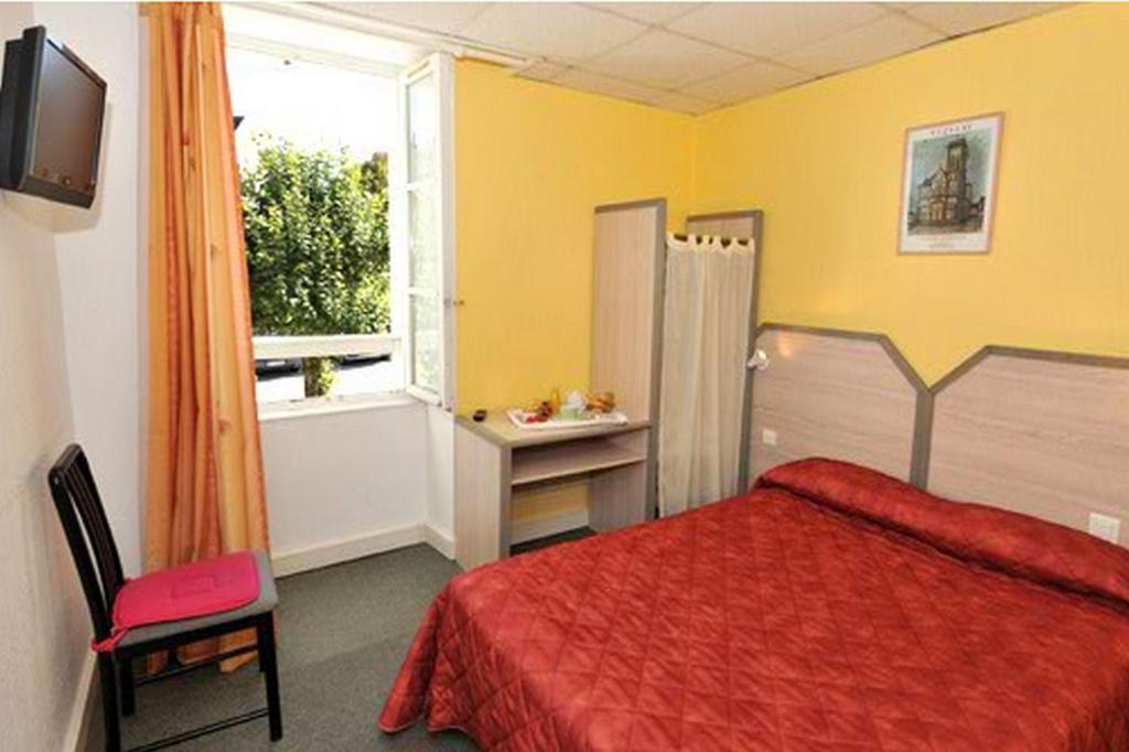 Le Compostelle Hotell Vézelay Rom bilde