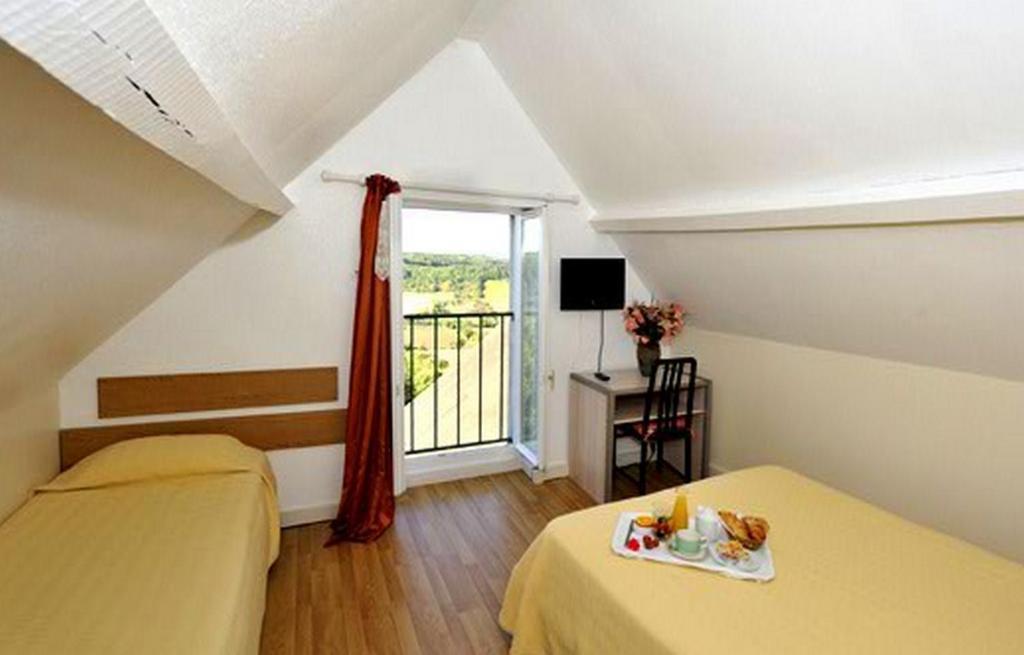 Le Compostelle Hotell Vézelay Rom bilde
