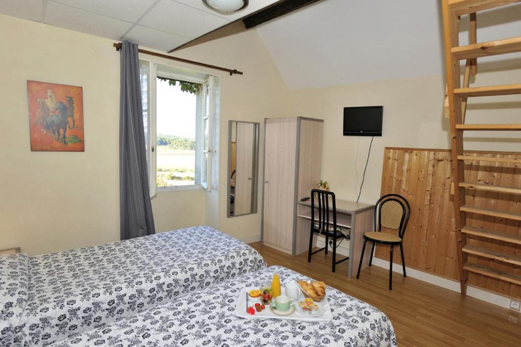 Le Compostelle Hotell Vézelay Rom bilde